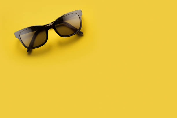 istock Glasses isolated on yellow with clipping path 1049281462