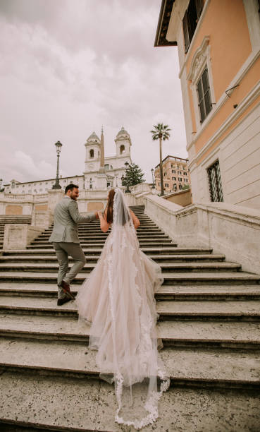 Young wedding couple on Spanish stairs in Rome
