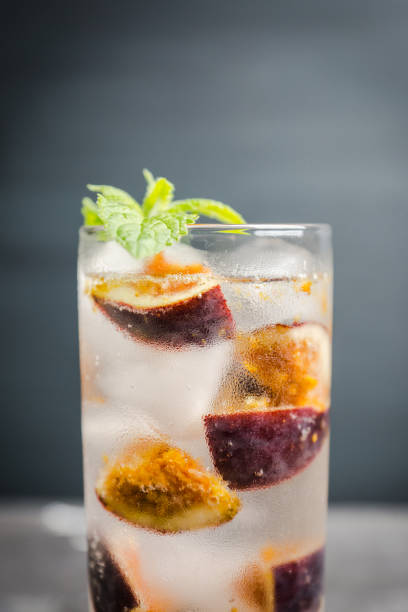 istock Figs mojito cocktail on the wooden background 1049295898
