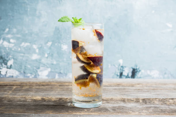 istock Figs mojito cocktail on the wooden background 1049295938