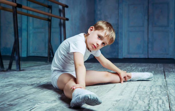 boy ballet dancer  at  dance class stock photo