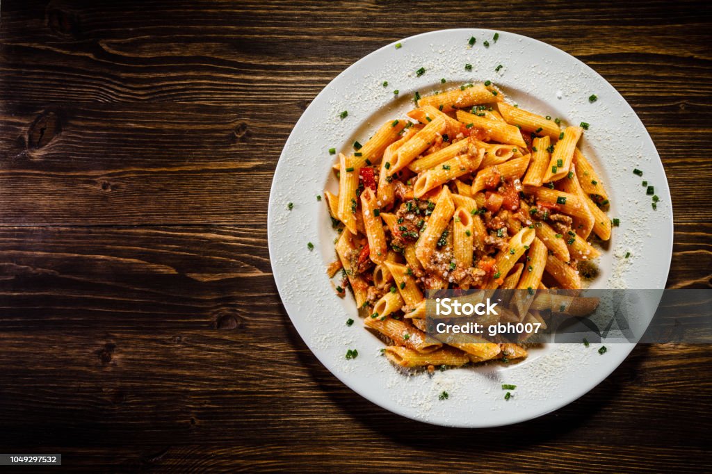 Penne with tomato sauce and pork Pasta Stock Photo