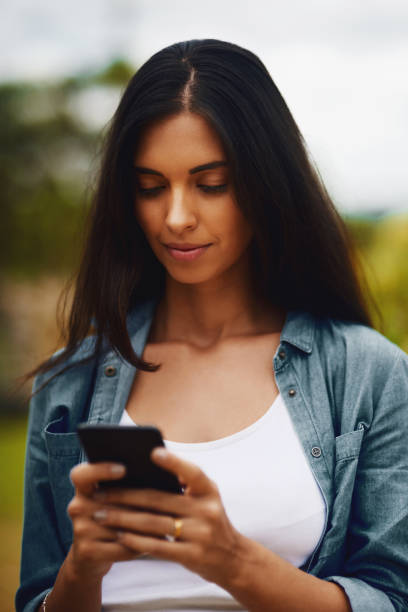 istock She takes her social network with her wherever she goes 1049309388