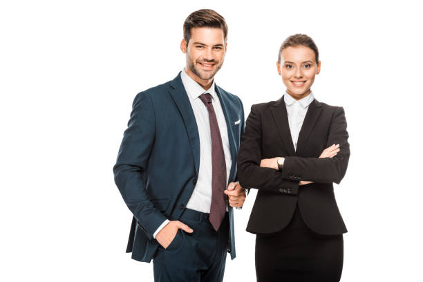 istock successful young business partners in stylish suits looking at camera isolated on white 1049314478