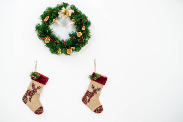 The two socks and christmas on the white wall