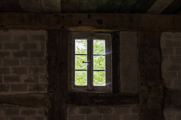 istock The window of an old farmhouse, inside 1049320984
