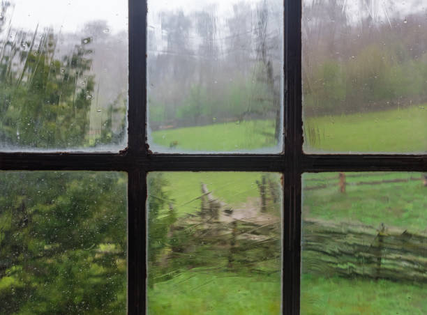 istock The window of an old farmhouse, inside 1049325120