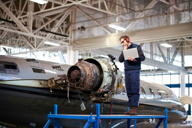 istock Aircraft mechanic in the hangar 1049329168