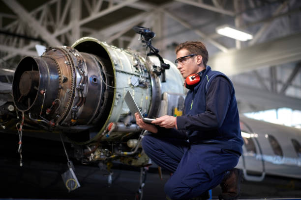 istock Aircraft mechanic in the hangar 1049329244