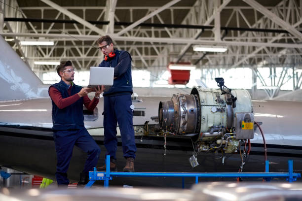 istock Aircraft mechanics in the hangar 1049331520