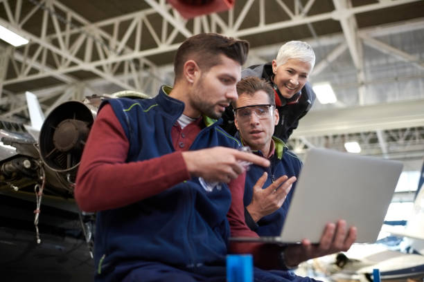 istock Aircraft mechanics in the hangar 1049331564