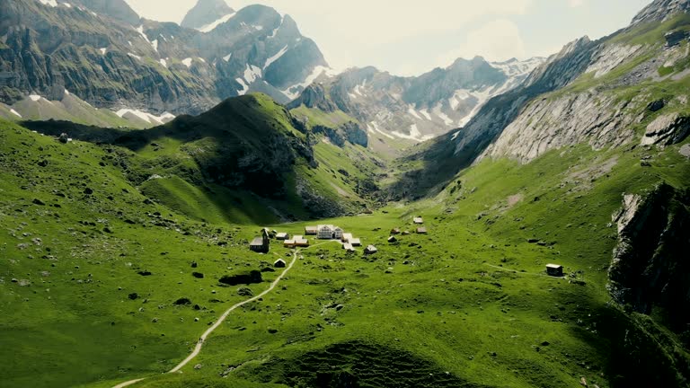 Aerial view of village in mountains in Switzerland