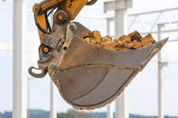 istock construction site shovel with stones and earth 1049346124