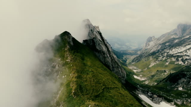 Aerial view of mountains in fog  Switzerland