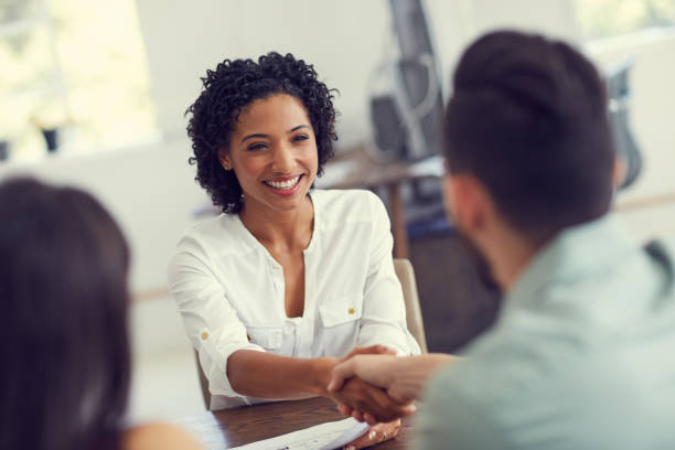 Its great to meet you Cropped shot of a young therapist meeting a couple for a counselling session employee introduction stock pictures, royalty-free photos & images