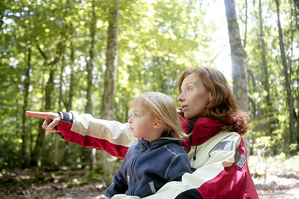 istock Beautiful blond little daughter mum in the forest 104935341