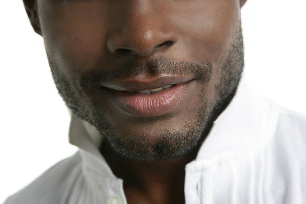istock African american cute black young smiling man portrait 104935357