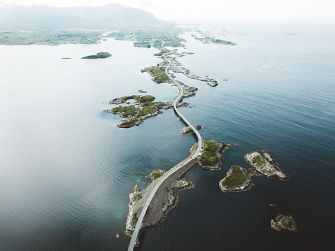 Aerial view of stunning bridge road and small islands in the sea in Norway