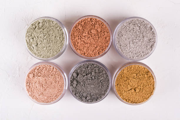 set of different cosmetic clay mud powders on white background - mud spa treatment health spa massaging imagens e fotografias de stock