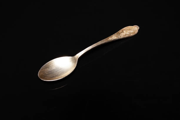 istock silver spoon, vintage precious metal 1049354842