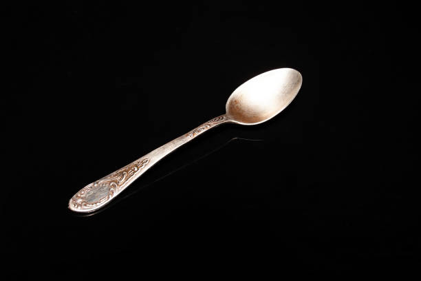 istock silver spoon, vintage precious metal 1049354846