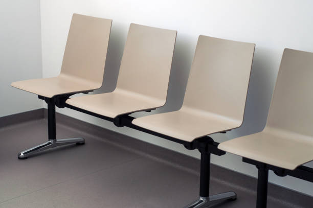 istock beige chair alignment in a waiting room 1049361612