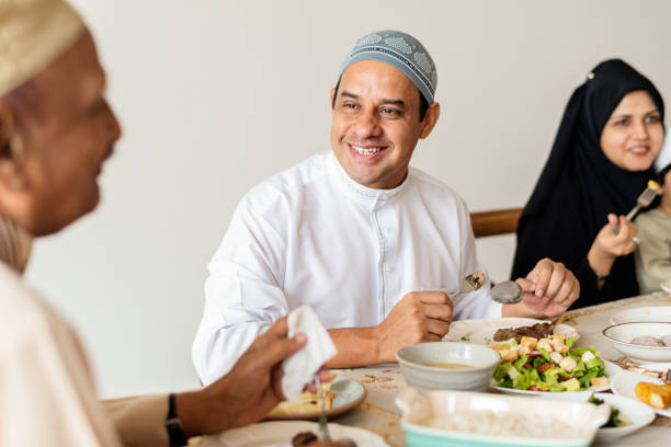 istock Muslim family having a Ramadan feast 1049361722