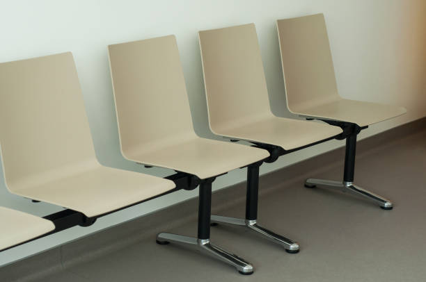 istock beige chair alignment in a waiting room 1049362358