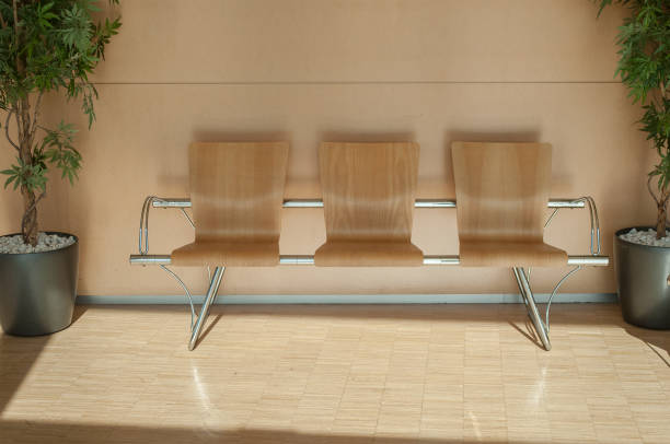 istock wooden chair alignment in a waiting room 1049362406