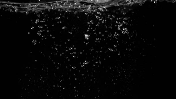 istock Water bubbles floating on black background with oil paint effect which represent refreshing of refreshment from soda 1049365434
