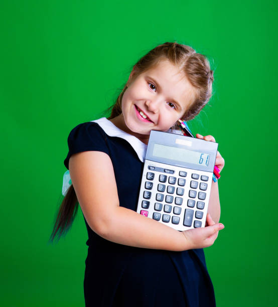 istock girl  with a calculator 1049365676