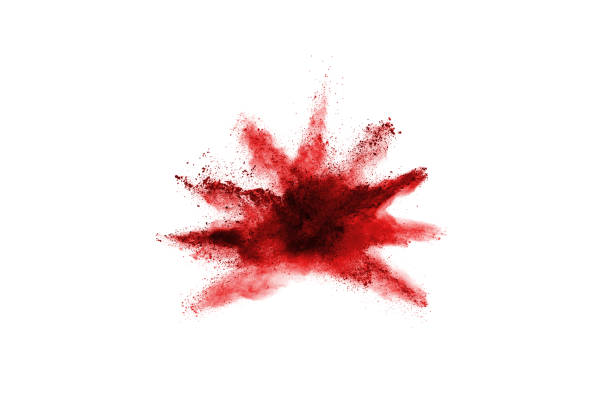 istock Freeze motion of red powder exploding, isolated on white background. Abstract design of red dust cloud. Particles explosion screen saver, wallpaper 1049369846