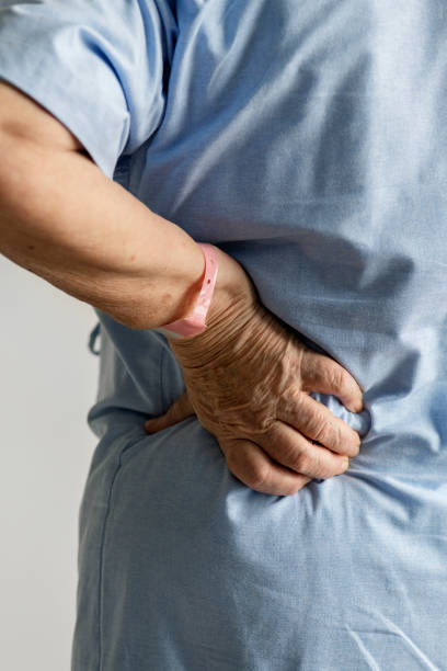 istock Elderly woman with back pain 1049369952