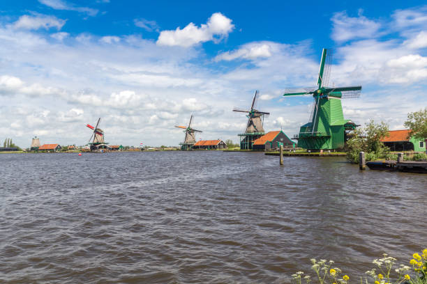 istock Traditional Dutch windmills at Zaanse Schans closed to Amsterdam 1049373536