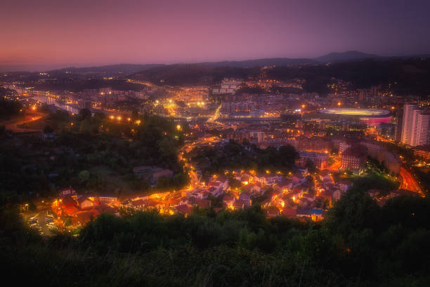 istock Bilbao and Maustegi village at night 1049376576