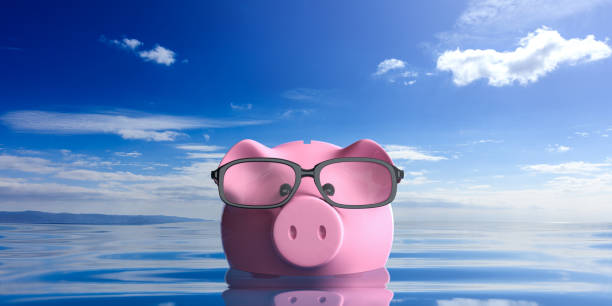 istock 3d rendering piggy bank wearing eyeglasses 1049384936
