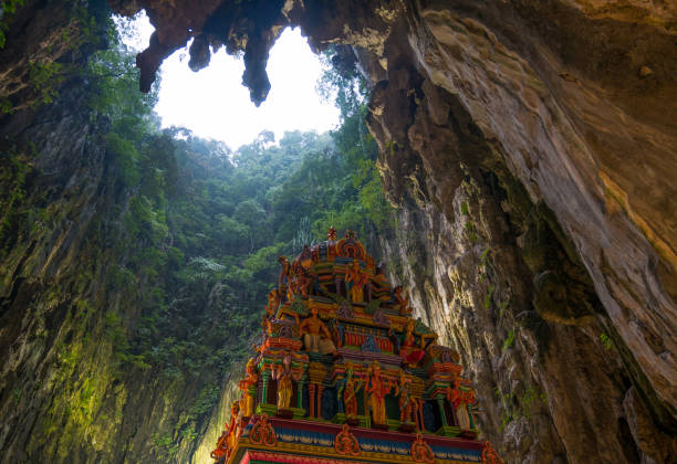 istock Batu Caves Kuala Lumpur Malaysia, scenic interior limestone cavern decorated with temples and Hindu shrines, travel destination in South East Asia trip. 1049385998