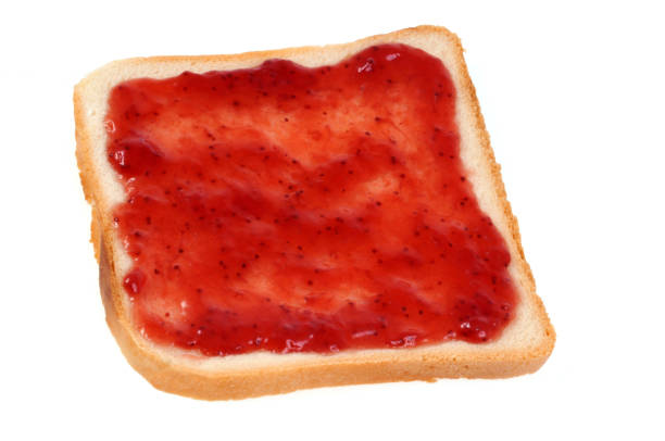 istock Slice of crumb bread and strawberry jam 1049388340