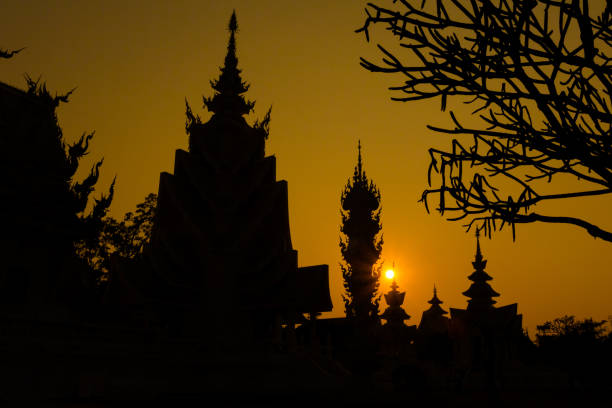 Beautiful buddhist Wat Rong Khun white temple in Chiang Rai in northern Thailand. Cityscape with beautiful religion architecture in south east Asia.