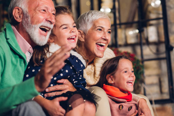 Happy grandparents with grandchildren Joyful children with their grandparents outdoors multi generation family christmas stock pictures, royalty-free photos & images