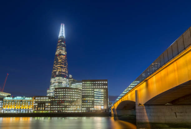 istock London Bridge And Shard Tower In The Night 1049397046