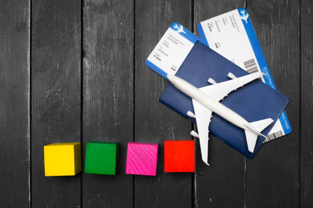 istock Travel objects on wooden background 1049399712