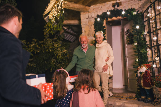 istock Young family visiting grandparents 1049400036