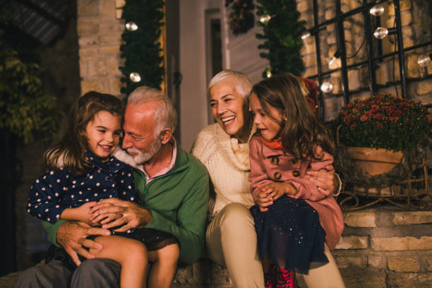 istock Old people with grandchildren 1049400682