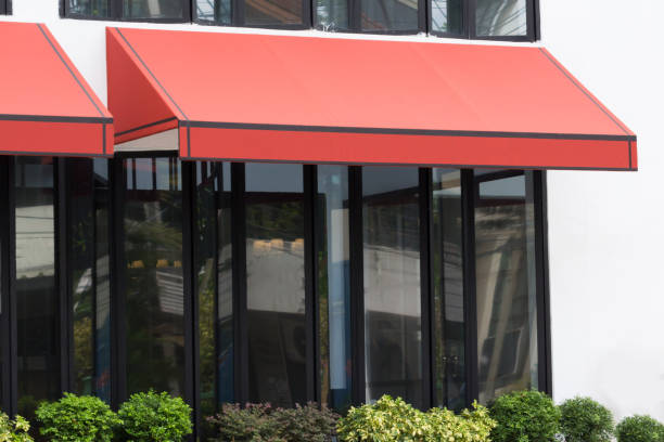 istock orange awning over glass windows and black aluminium frame, canvas shading 1049406574