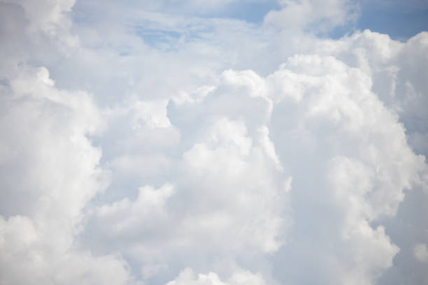 istock white cloud and blue sky background and texture, cloudy day. weather forecast concept. 1049406668