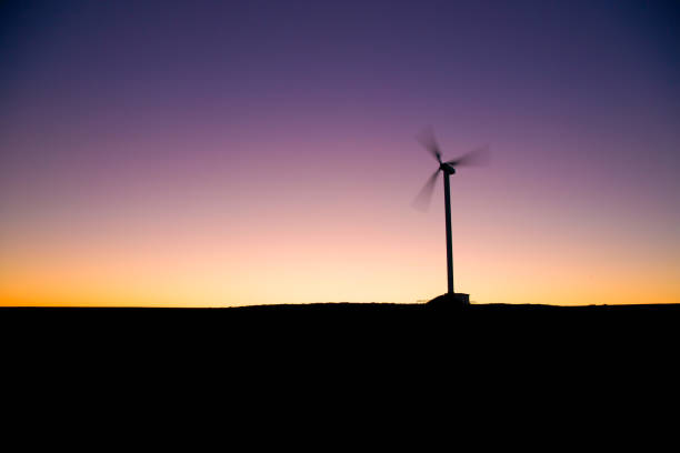 istock wind turbine and sunset 1049407552