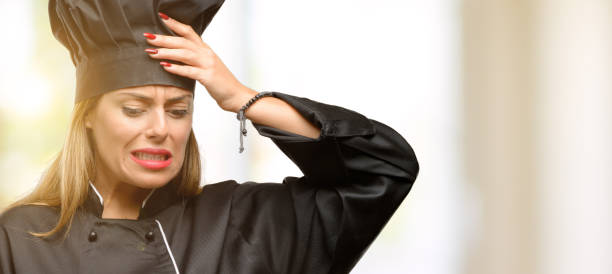 istock Young cook woman doubt expression, confuse and wonder concept, uncertain future 1049407648
