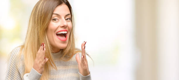 istock Young beautiful woman stressful keeping hands on head, terrified in panic, shouting 1049411236