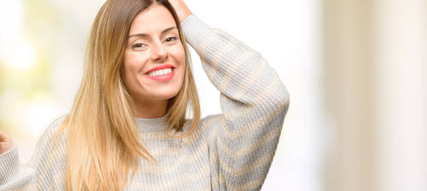 istock Young beautiful woman pointing away side with finger 1049411242